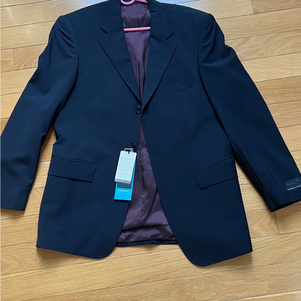 New navy suit jacket with tags made in Turkey
